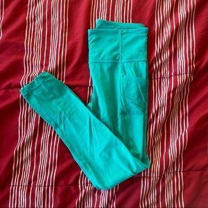green/blue athleta salutation leggings